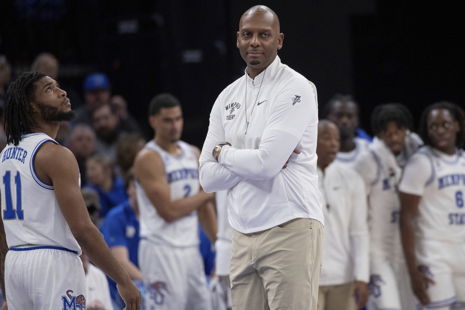 <strong>Memphis Tigers head coach Penny Hardaway, center, looks on during the second half of an NCAA college basketball game against UAB on Jan. 26.</strong> (Nikki Boertman/AP file)