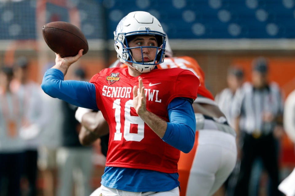 <strong>American team quarterback Seth Henigan of Memphis (16) runs through drills during practice for the Senior Bowl NCAA college football game, Wednesday, Jan. 29, 2025, in Mobile, Ala.</strong> (Butch Dill/AP)