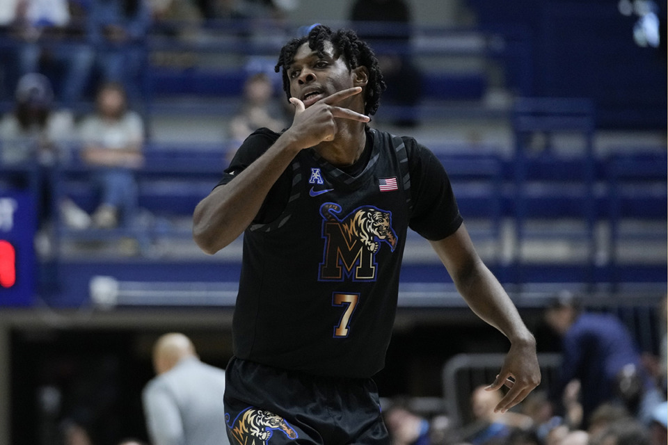 <strong>Memphis guard PJ Carter (7) celebrates after making a 3-pointer during the second half of an NCAA college basketball game against Rice in Houston, Sunday, Feb. 2, 2025.</strong> (Ashley Landis/AP Photo)