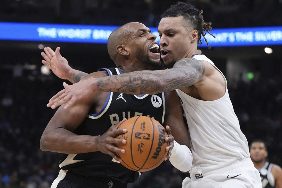 <strong>Milwaukee Bucks' Khris Middleton battles Memphis Grizzlies' Brandon Clarke during the first half of an NBA basketball game Sunday, Feb. 2, 2025, in Milwaukee.</strong> (Morry Gash/AP Photo)