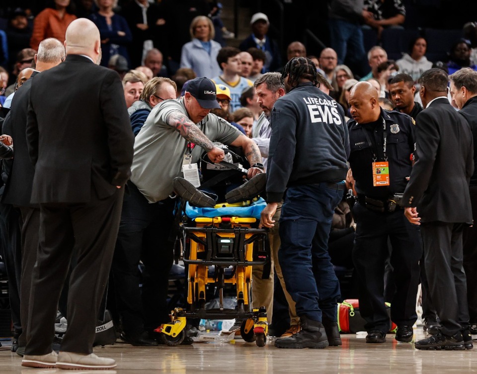 <strong>Memphis Grizzlies staff perform CPR on a fan, delaying the start of the game against the San Antonio Spurs on Monday, Feb. 3, 2025.</strong> (Mark Weber/The Daily Memphian)