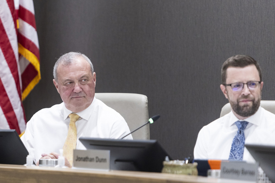 <strong>Scott Benjamin, left, participates in an Arlington Community Schools board meeting.</strong> (Brad Vest/Special to The Daily Memphian)