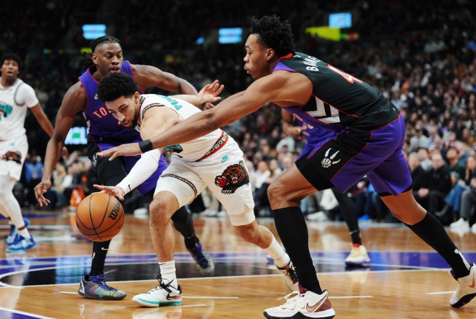 <strong>Memphis Grizzlies guard Scotty Pippen Jr. (front left) tries to get by Toronto&rsquo;s Scottie Barnes (right) on Wednesday, Feb. 5, 2025, in Toronto.</strong> (Frank Gunn/The Canadian Press via AP)