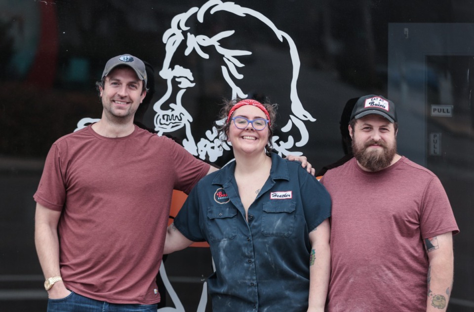 <strong>Ryan Glosson, Heather Bain and Bryant Bain pose for a portrait at the Barksdale Restaurant Feb. 4, 2025.</strong> (Patrick Lantrip/The Daily Memphian)