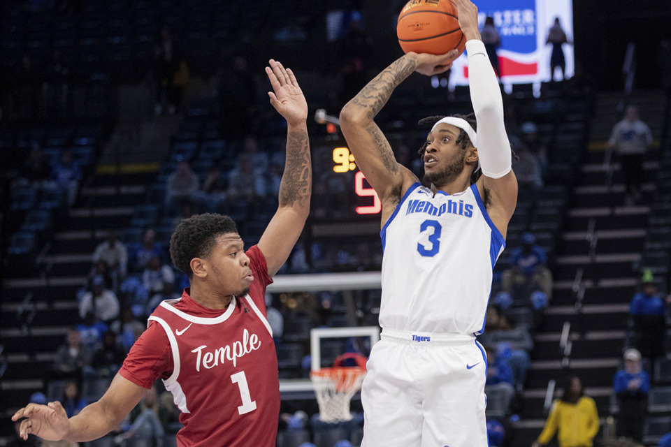 <strong>Memphis guard Colby Rogers (3) looks to shoot while defended by Temple guard Zion Stanford (1) during the first half of an NCAA college basketball game Sunday, Feb. 9, 2025, in Memphis.</strong> (Nikki Boertman/AP Photo)