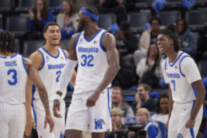 <strong>Memphis forward Nicholas Jourdain (2), center Moussa Cisse (32) and guard PJ Carter (7) celebrate after a dunk by Cisse against Temple during the first half of an NCAA college basketball game Sunday, Feb. 9, 2025, in Memphis.</strong> (Nikki Boertman/AP Photo)