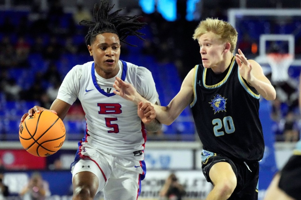 <strong>Bartlett guard Christian Alston (5) drives against Brentwood&rsquo;s Jackson McCutcheon (20) during the second half of a Class 4A basketball game Wednesday, March 13, 2024, in Murfreesboro, Tenn.</strong> (Mark Humphrey/Special to The Daily Memphian)