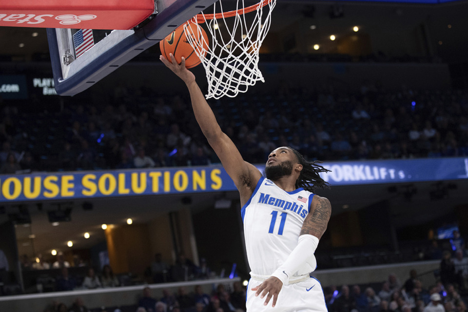 <strong>Tigers guard Tyrese Hunter (11) shoots during the first half of an NCAA college basketball game against Tulsa on Feb. 5.</strong> (Nikki Boertman/AP file)