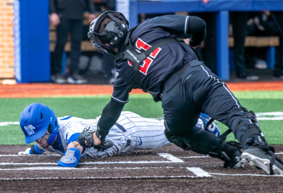 <strong>Memphis shortstop Creek Robertson slides safe into home as Southeast Missouri's Shea McGahan tries to make the tag.</strong> (Greg Campbell/Special to The Daily Memphian)