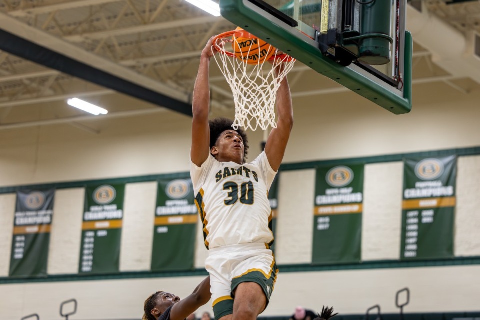 <strong>Fred Smith Jr. (30) of Briarcrest dunks the ball during the game against Trezevant High School on Nov 19, 2024, at Briarcrest Christian School.</strong> (Wes Hale/Special to the Daily Memphian file)