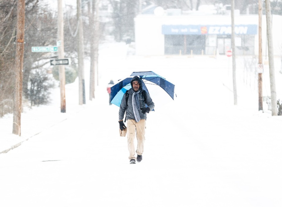 <strong>An individual braves the fridge temperature and snowy conditions on Wednesday, February 19, 2025.</strong> (Mark Weber/The Daily Memphian)