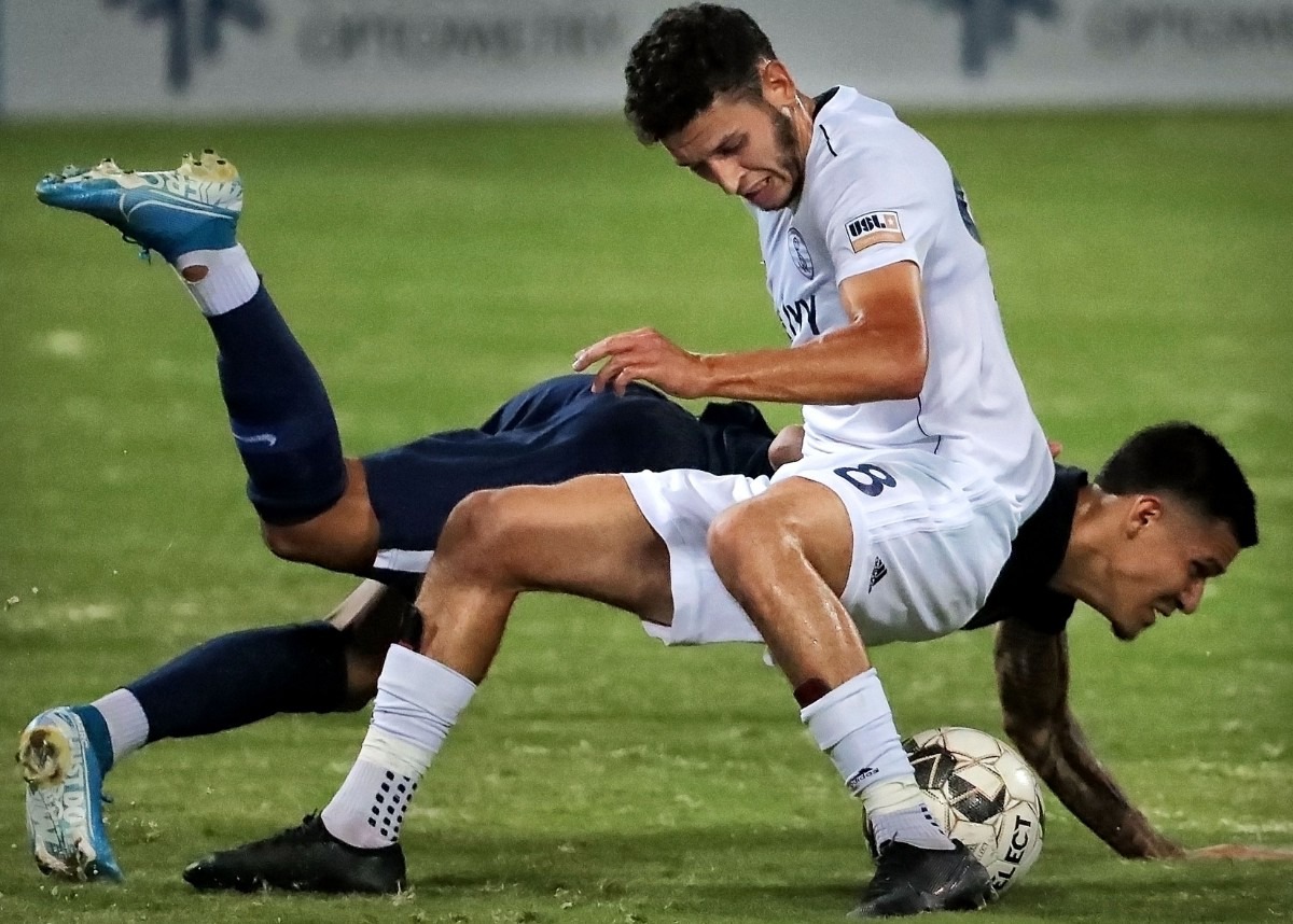 <strong>Memphis midfielder Pierre Da Silva collides with the Rangers' Ayyoub Allach during 901FC's 4-2 win over Swope Park at AutoZone Park on Sept. 7, 2019.</strong> (Jim Weber/Daily Memphian)
