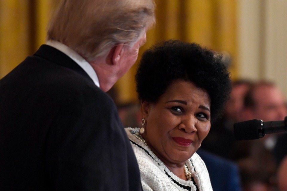 <strong>&nbsp;In this April 1, 2019, file photo President Donald Trump, left, listens as former prisoner Alice Marie Johnson, right, speaks at the 2019 Prison Reform Summit and First Step Act Celebration in the East Room of the White House in Washington. The great-grandmother spent 21 years in prison for a nonviolent drug offense before Trump commuted her sentence in 2018</strong>. (Susan Walsh/AP File)