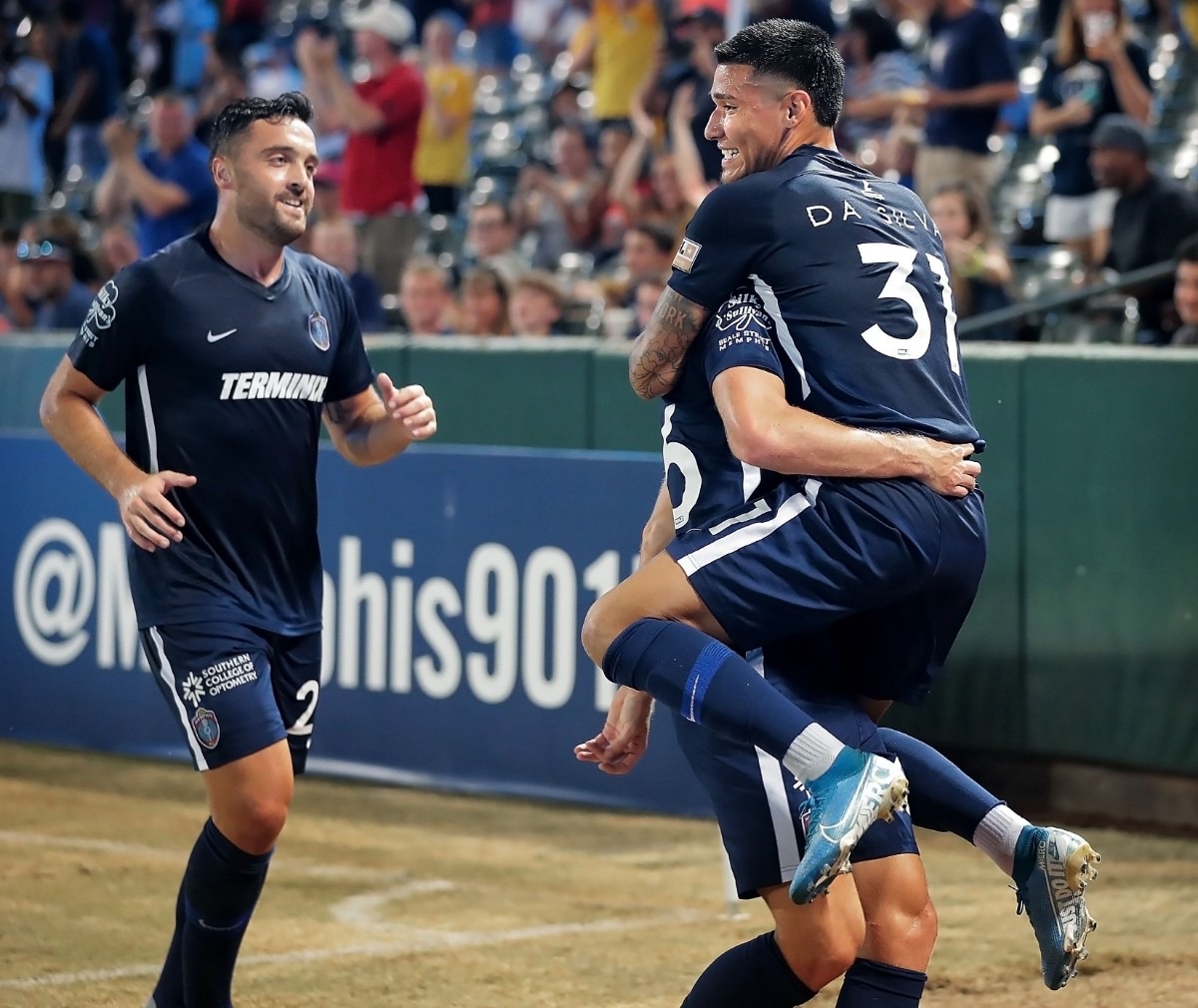 <strong>Memphis midfielder Pierre Da Silva (right) celebrates with collides with Josh Morton after a score during 901 FC's 4-2 win over Swope Park at AutoZone Park on Sept. 7, 2019.</strong> (Jim Weber/Daily Memphian)