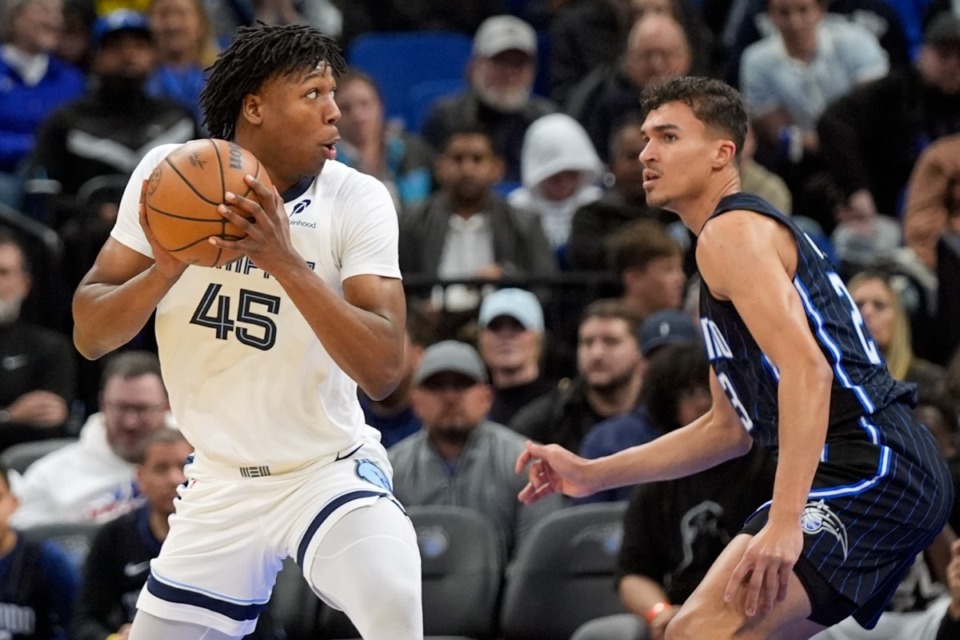 <strong>Memphis Grizzlies forward GG Jackson (45) looks to pass as he is guarded by Orlando Magic forward Tristan da Silva, right, Friday, Feb. 21, 2025, in Orlando, Fla.</strong> (AP Photo/John Raoux)