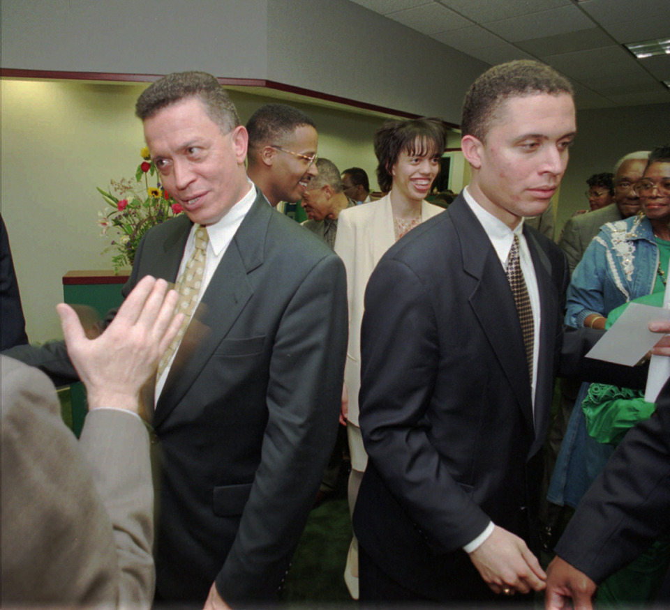 <strong>Then-U.S. Rep. Harold Ford, D-Tenn., and his son Harold Ford Jr. (right) shake hands with supporters in this April 11, 1996, file photo in Memphis.</strong> (Dave Darnell/Commercial Appeal/AP file)