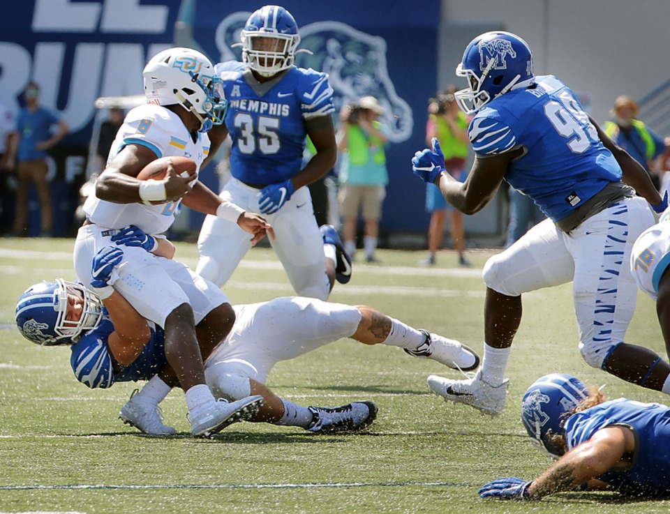 <strong>University of Memphis defensive end Cole Mashburn (46) sacks Southern University quarterback Ladarius Skelton (8) during the first half of a 55-24 victory over Southern University at the Liberty Bowl Saturday, Sept. 7.</strong> (Patrick Lantrip/Daily Memphian)