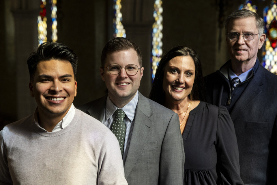 <strong>From left: Robert Rios, Landry Duvall, Kim Collins, and John Collins pose for a photo inside Idlewild Presbyterian Church. After Landry was adopted, his birth mother was killed in a car accident. Landry has reunited with her family after three decades.</strong> (Brad Vest/Special to The Daily Memphian)