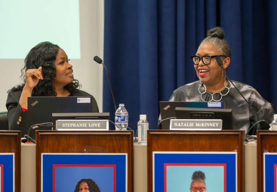 <strong>Memphis-Shelby County Schools board members Stephanie Love&nbsp; (District 3) and Natalie McKinnie (District 2) share a laugh at the MSCS meeting Feb. 25, 2025.</strong> (Greg Campbell/Special for The Daily Memphian)