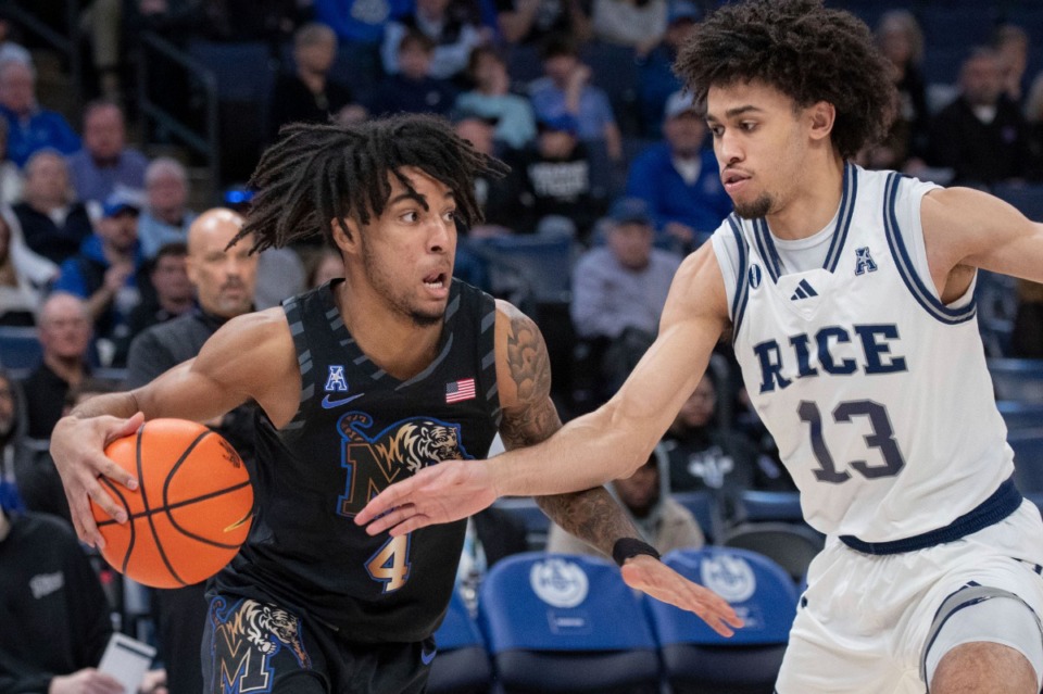 <strong>Memphis guard PJ Haggerty (4) drives against Rice forward Andrew Akuchie (13) on Wednesday, Feb. 26, 2025. &ldquo;I&rsquo;d say every game is different, every ref is different,&rdquo; he said.</strong> (Nikki Boertman/AP)