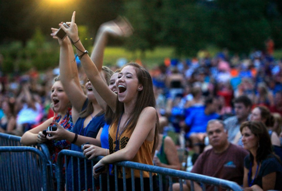 <strong>Emily Simpson, from left, Jordan Wise, Neely Van Frack and Addie James cheer for opening act Parachute at the final performance of Live at the Garden featuring the Goo Goo Dolls and Michelle Branch in 2011.</strong> (The Daily Memphian file)