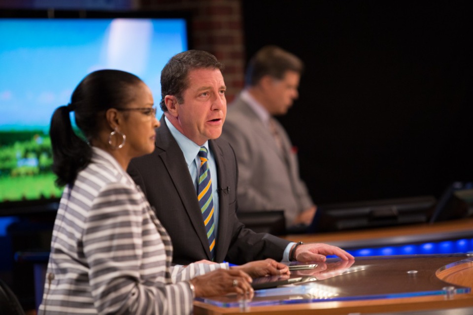 <strong>From left to right: Former News Channel 3 (WREG-TV) evening anchors Claudia Barr and Richard Ransom read the news with meteorologist Jim Jaggers.</strong> (The Daily Memphian file)