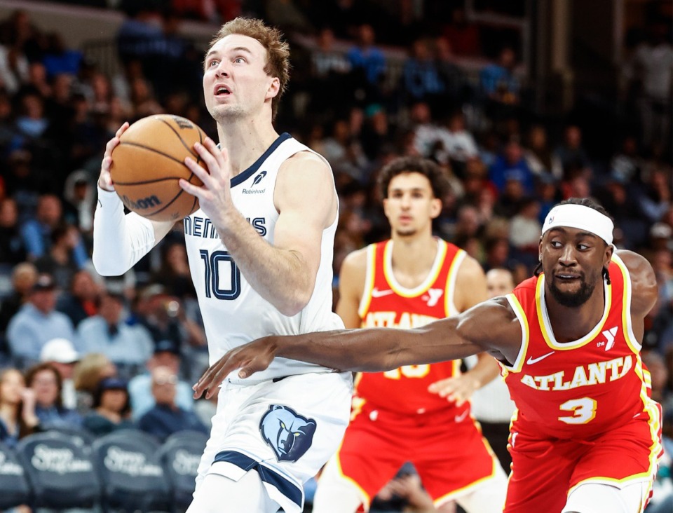 <strong>Memphis Grizzlies guard Luke Kennard (left) drives by Atlanta&rsquo;s Caris LeVert (right) on Monday, March 3, 2025.</strong> (Mark Weber/The Daily Memphian)