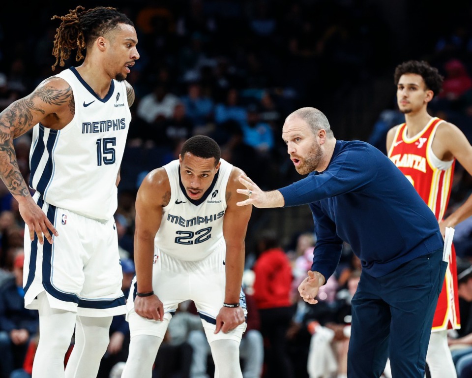 <strong>Memphis Grizzlies head coach Taylor Jenkins (right) on the sideline with players Brandon Clarke (left) and Desmond Bane (middle) during action against the Atlanta Hawks on Monday, March 3, 2025.</strong> (Mark Weber/The Daily Memphian)