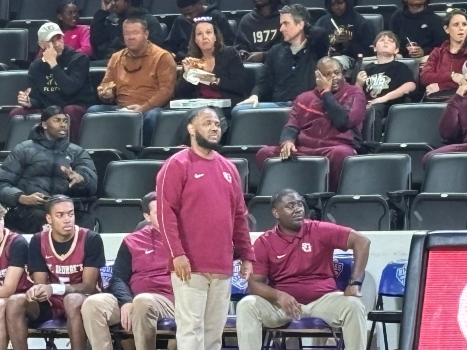 <strong>St.&nbsp;George&rsquo;s Gryphons coach Dee Wilkes (standing) watches his team from the sideline in the state semifinal game in Cookeville, Tennessee.</strong> (John Varlas/The Daily Memphian)