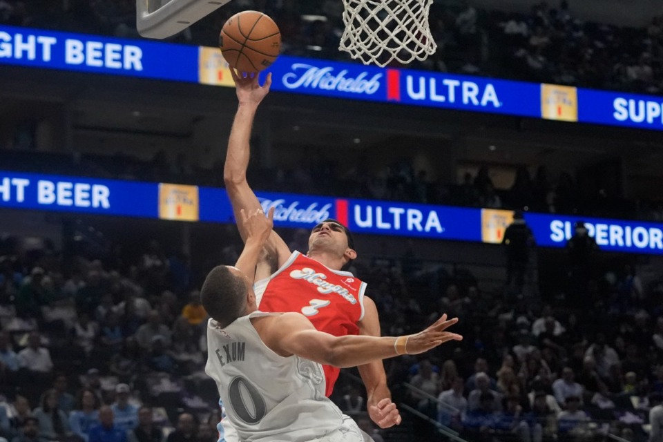 <strong>Memphis Grizzlies forward Santi Aldama (7) shoots against Dallas Mavericks guard Dante Exum (0) in Dallas, Friday, March 7, 2025.</strong> (LM Otero/AP)