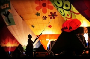 <strong>A team member helps keep a hot air balloon tethered to the ground during the Spirit of Boise Balloon Classic nighttime glow show on Aug. 30, 2019, in Morrison Park in Boise, Idaho. A&nbsp; balloon glow is also among the events planned for the Great Bluff City Balloon Jamboree that is set for next June in Collierville.</strong> (Jim Weber/Daily Memphian)