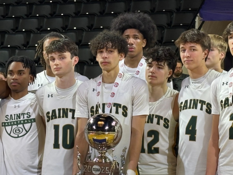 <strong>Briarcrest players posed Saturday, March 8 with their runner-up trophy. Senior Landon Rogers held the Silver Ball.</strong> (John Varlas/The Daily Memphian)