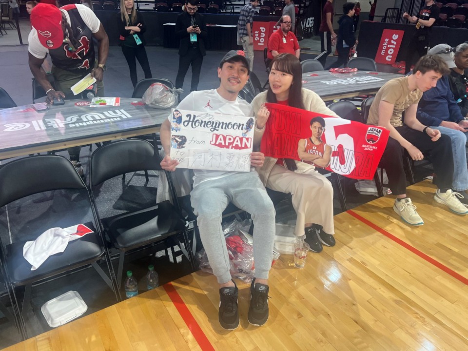 <strong>Daiki Sato (left) and Chisato Sato (right) went to the Memphis Hustle game for their honeymoon.</strong> (Drew Hill/The Dailly Memphian)