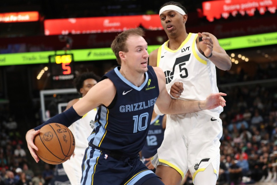 <strong>Memphis Grizzlies guard Luke Kennard (10) drives to the basket against Utah Jazz forward Cody Williams (5) in the second half of an NBA basketbaon March 12, 2025. Kennard hit 7 of 9 from 3-point range, and paced the Grizzlies with 30 points.</strong> (Nikki Boertman/AP)