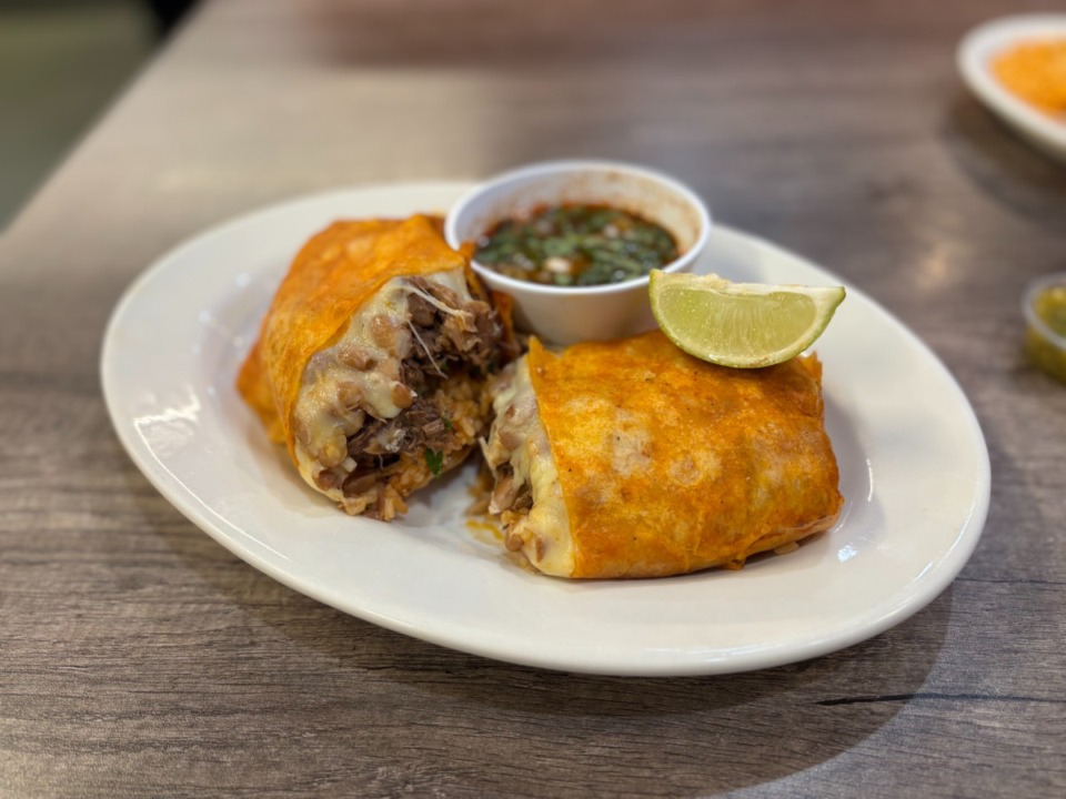 <strong>Chukis Tacos No. 2&rsquo;s Birriburro is a stuffed burrito filled with birria de res, rice, beans, mozzarella, tomatoes, onions and jalape&ntilde;os.</strong> (Joshua Carlucci/Special to The Daily Memphian)