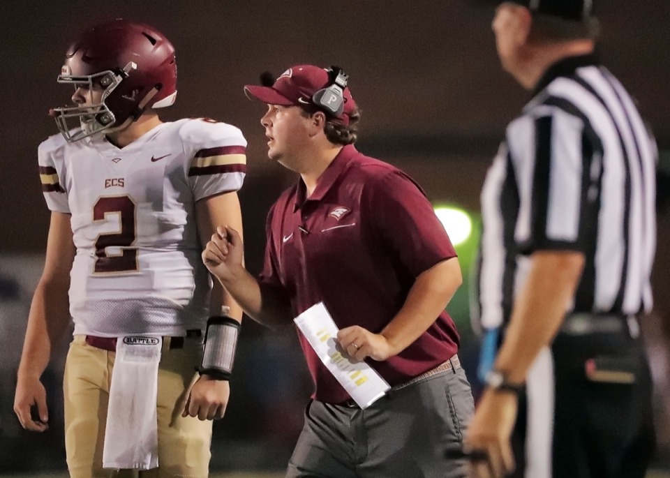 <strong>Evangelical Christian School head coach Trey Adams calls a play Friday at Houston in what ended as a 36-20 loss.</strong> (Jim Weber/Daily Memphian)