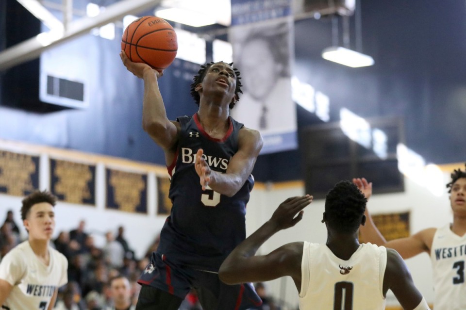 <strong>Terrence Clarke (5) shoots&nbsp;<span>during a high school basketball game on Jan. 13, 2019, in the Bronx, NY.</span>&nbsp;Clarke announced on Sept. 14, 2019, that he will play for Kentucky, opting to join the Wildcats over Memphis.</strong> (AP Photo/Gregory Payan)