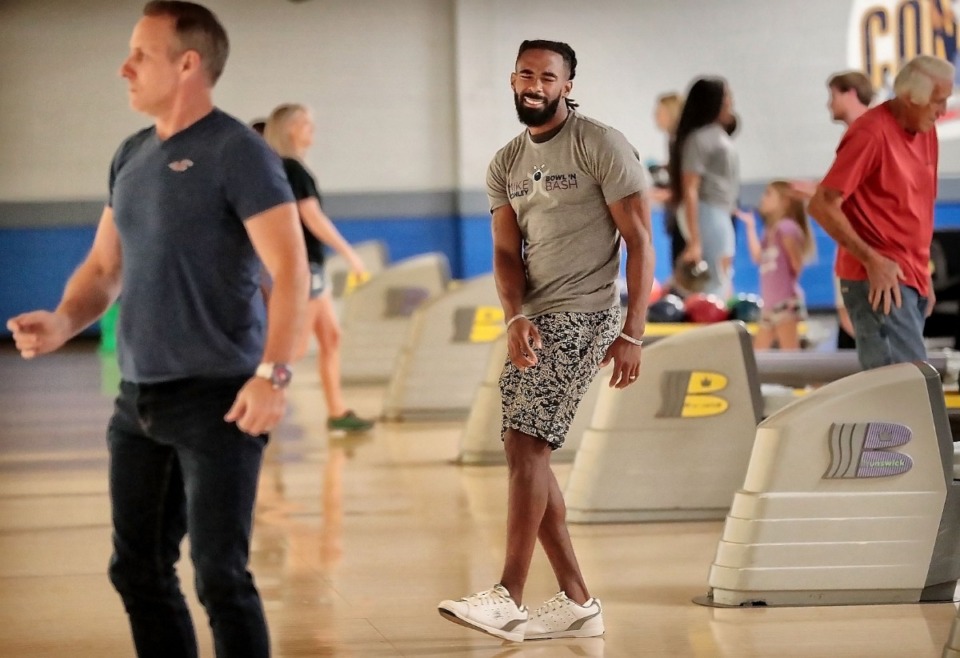 <strong>Former Grizzlies point guard Mike Conley winces as he misses a spare while bowling in his annual Bowl-n-Bash charity event at Billy Hardwick All-Star Lanes on Sept. 14, 2019, to raise money for the Methodist Comprehensive Sickle Cell Center.</strong> (Jim Weber/Daily Memphian)