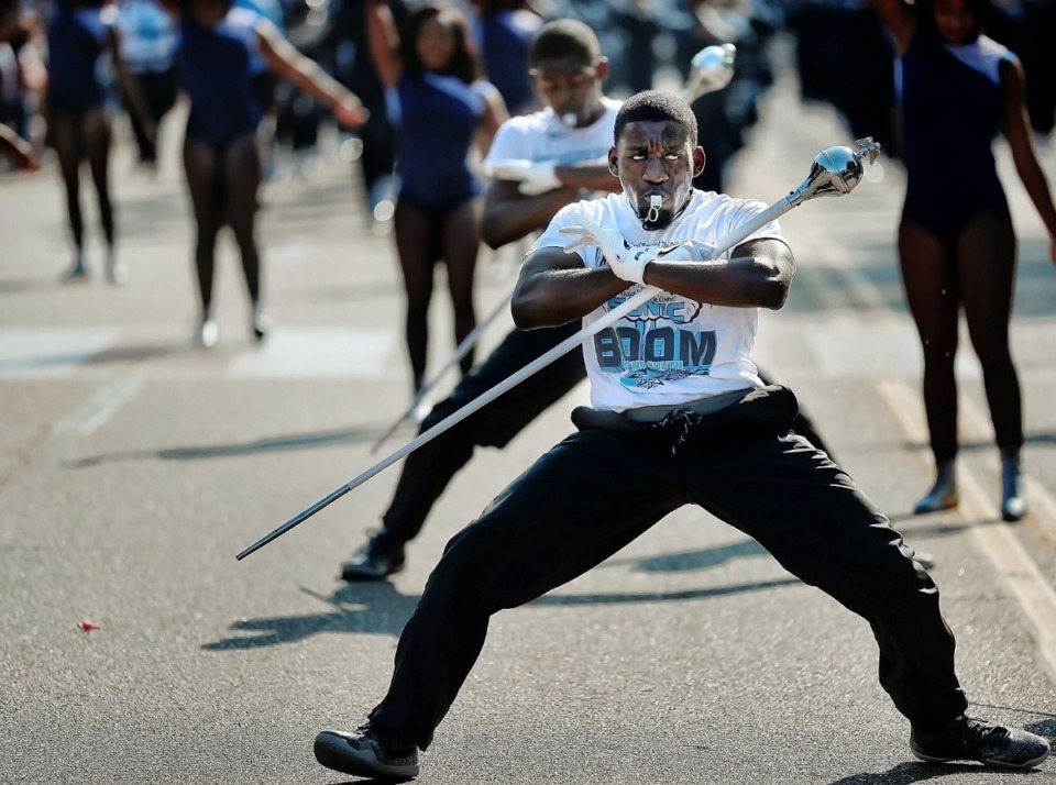 <strong>Drum majors with the Jackson State Sonic Boom of the South Marching Band perform during the Southern Heritage Classic Parade on Park Avenue in Orange Mound on Sept. 14, 2019. The annual parade, presented by the Orange Mound Community Parade Committee (OMCPC), marks the 30th anniversary of the SHC football game with marching bands, majorettes, fancy cars and lots of tossed candy.</strong> (Jim Weber/Daily Memphian)