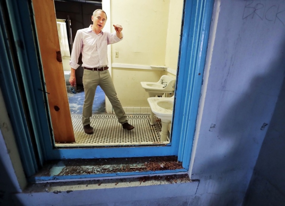 <strong>Lexington Asset Management CEO Eric Clauson conducts a tour of the 109-year-old building that housed the Barksdale Mounted Police Station. The&nbsp; building soon will undergo a $1.8 million renovation to convert it into offices and several apartments.</strong> (Jim Weber/Daily Memphian)