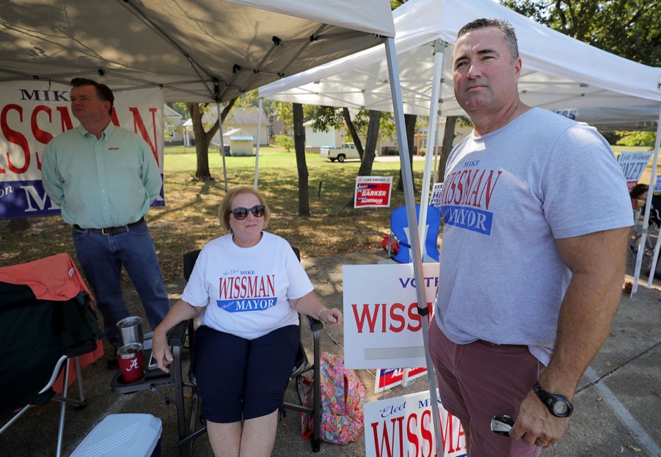<strong>Arlington mayoral candidate Mike Wissman (right) waits to greet voters at the Arlington United Methodist Church Sept. 19.</strong> (Patrick Lantrip/Daily Memphian)