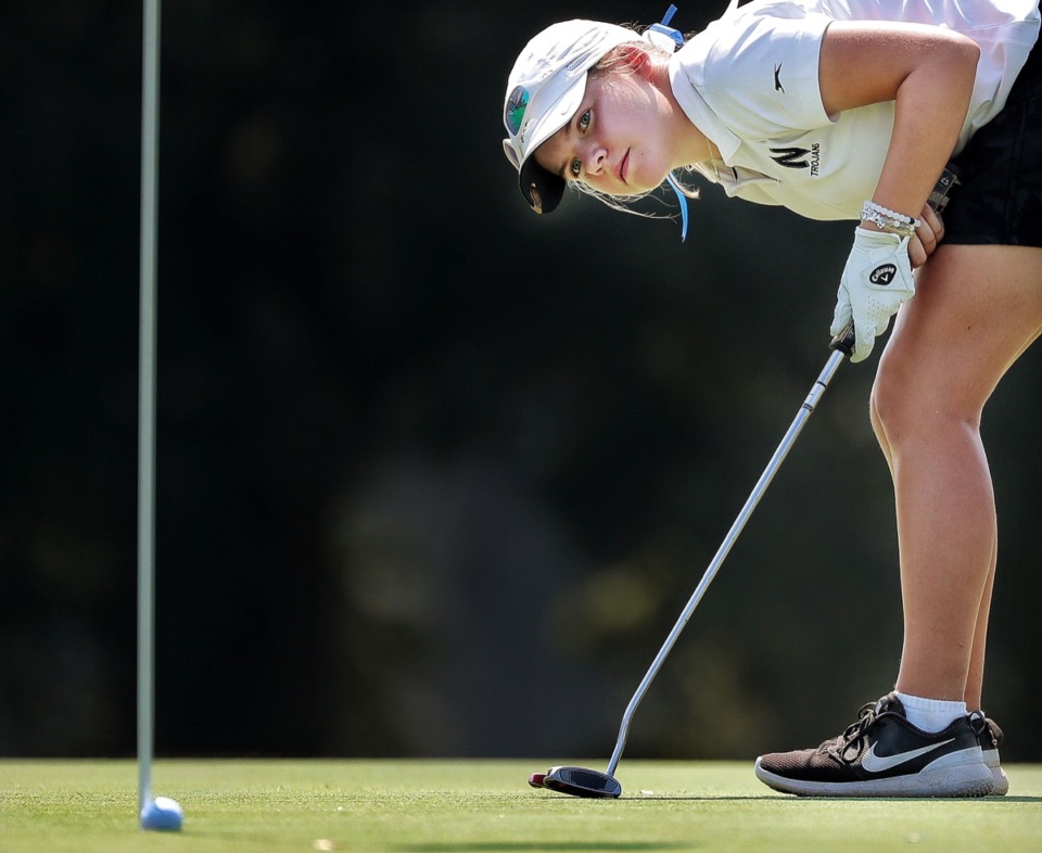 <strong>Ella Cress from Northpoint Christian School watches as she narrowly misses a putt on the 18th green.</strong> (Jim Weber/Daily Memphian)