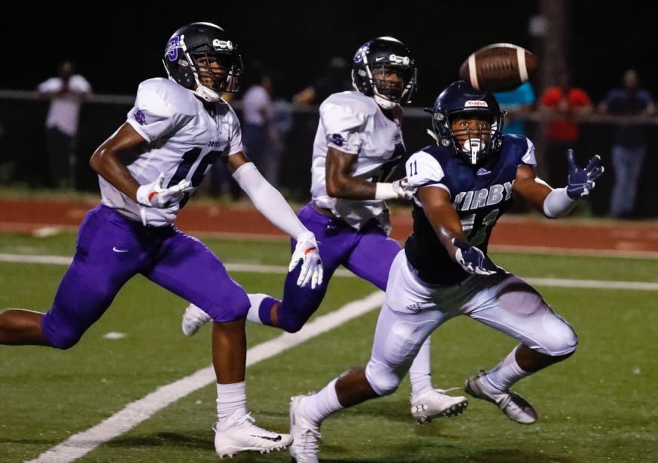 <strong>Kirby receiver Braden Crawford (right) can't haul in what could be a touchdown catch on a fake punt against Southwind Friday, Sept. 20.</strong> (Mark Weber/Daily Memphian)
