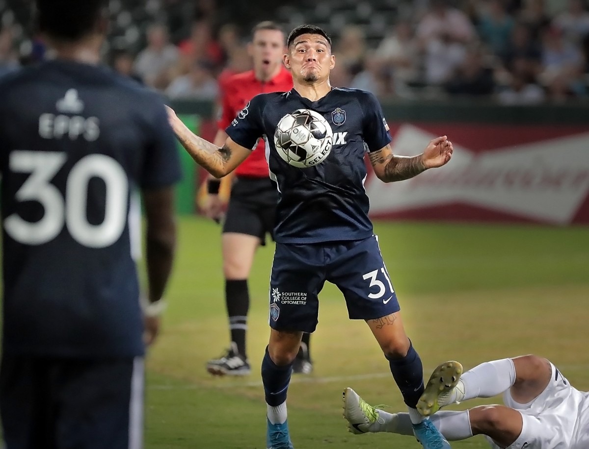 <strong>Memphis midfielder Pierre Da Silva (31) steals a high pass during 901FC's 1-0 win over St. Louis at AutoZone Park on Sept. 21, 2019.</strong> (Jim Weber/Daily Memphian)