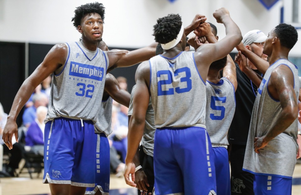 <strong>James Wiseman (left) huddles with his teammates during an open practice Sept. 24.</strong> (Mark Weber/Daily Memphian)
