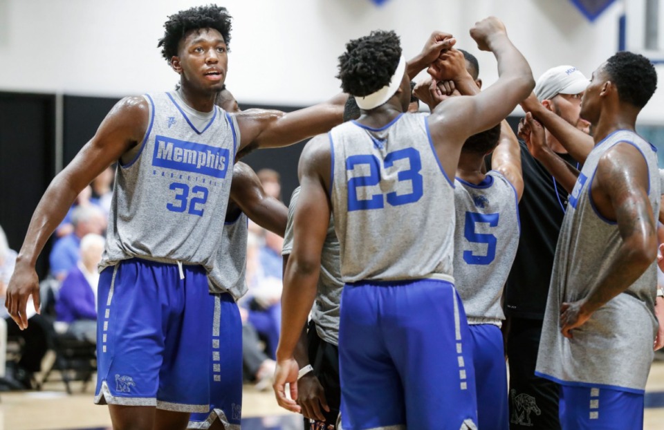 <strong>University of Memphis center James Wiseman (left) huddles with his teammates during an open practice in front of the Rebounders Club at Laurie-Walton Family Basketball Center Tuesday, Sept. 24, 2019.</strong> (Mark Weber/Daily Memphian)