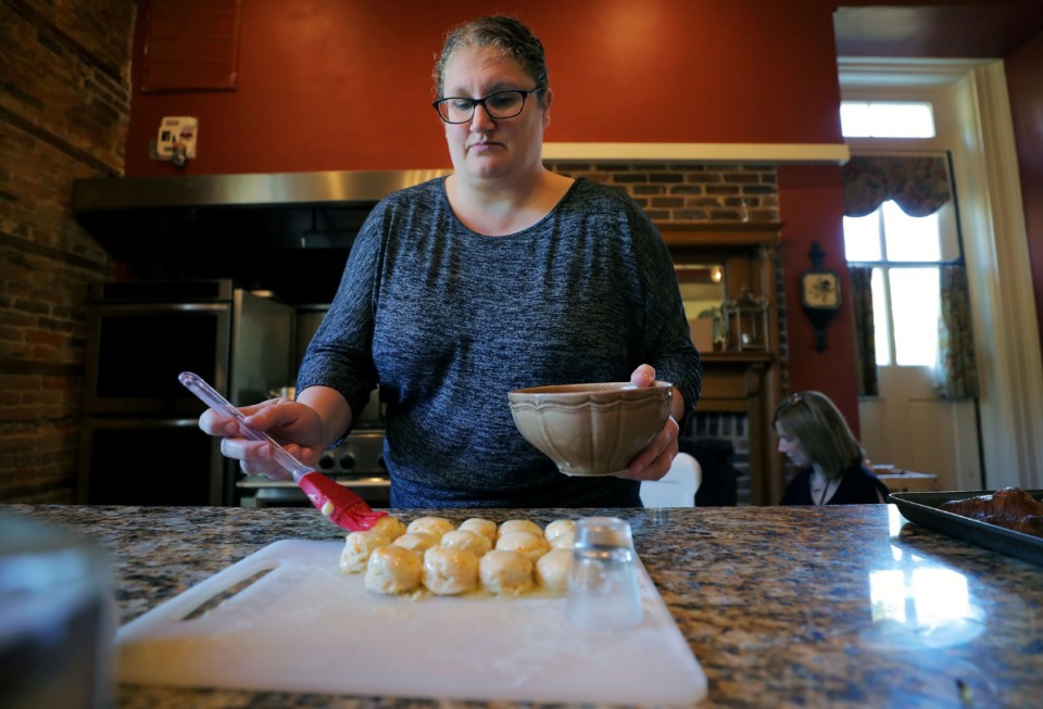 <strong>Kristie Smith prepares food at Cedar Hall Bed &amp; Breakfast in Bartlett during one of the venue's&nbsp; tea luncheons Sept. 24, 2019.</strong>&nbsp;<strong>The bed and breakfast&nbsp;is expanding to include an off-site catering company, Sweet Magnolia Catering.&nbsp;</strong>(Patrick Lantrip/Daily Memphian)