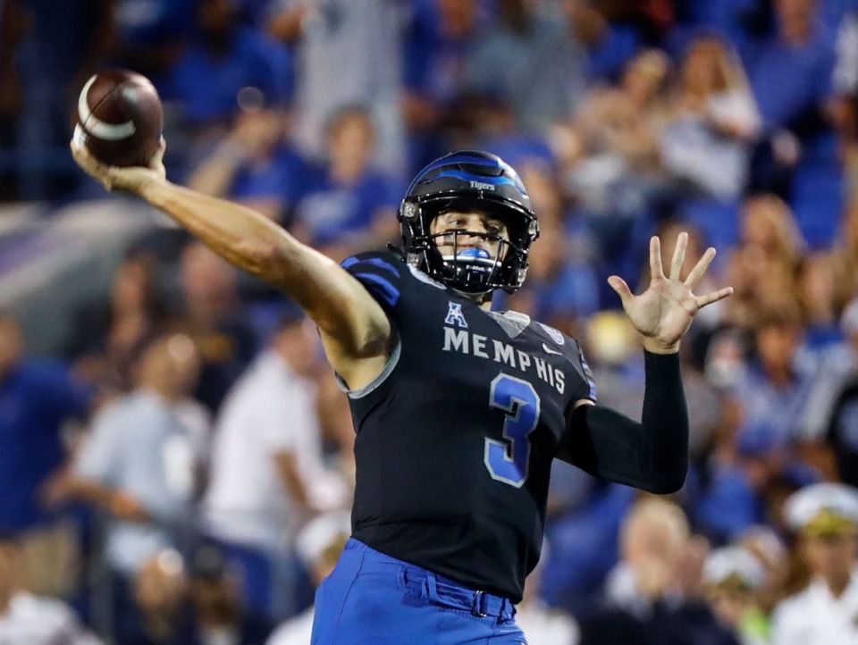 <strong>Memphis quarterback Brady White<span>&nbsp;threw for 196 yards and three touchdowns Thursday night as Memphis used big plays to defeat Navy 35-23</span>.</strong> (Mark Weber/Daily Memphian)