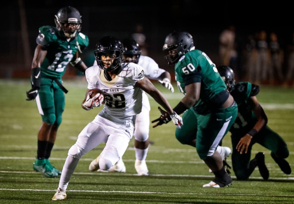 <strong>Whitehaven running back Tristian Taylor (with ball) runs&nbsp; for a first down Friday, Sept. 27, 2019.</strong> (Mark Weber/Daily Memphian)