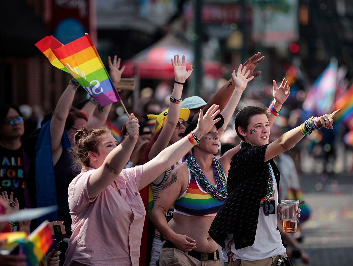 <strong>LGBTQ supporters cheer on their favorite groups and floats during the 16th annual Memphis Pride Parade along Beale Street on Saturday, Sept. 28.</strong> (Jim Weber/Daily Memphian)
